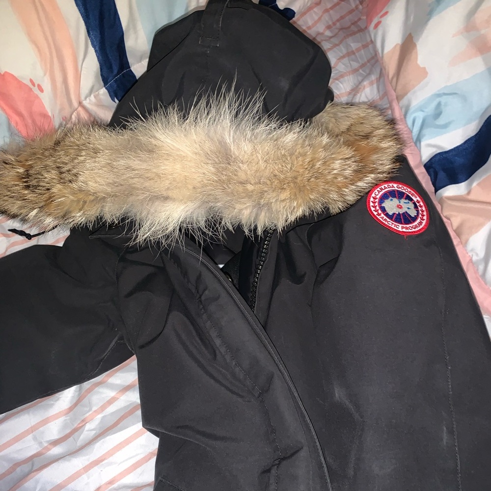 Black Women’s size small long style Canada Goose coat.